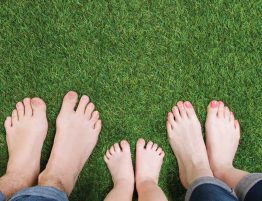 Family standing on septic system